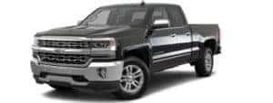 A black 2018 Chevy Silverado is facing left.