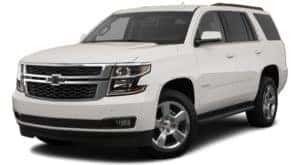 A white 2020 Chevy Tahoe is angled left.