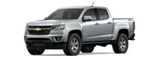 A silver 2018 Chevy Colorado Z71 is angled left.