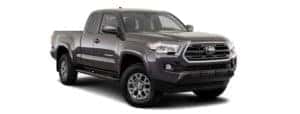 A dark grey 2019 Toyota Tacoma is facing right.