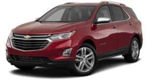 A red 2020 Chevy Equinox is facing left.