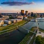 A birds eye view of Dayton, Oh is shown during a sunset.