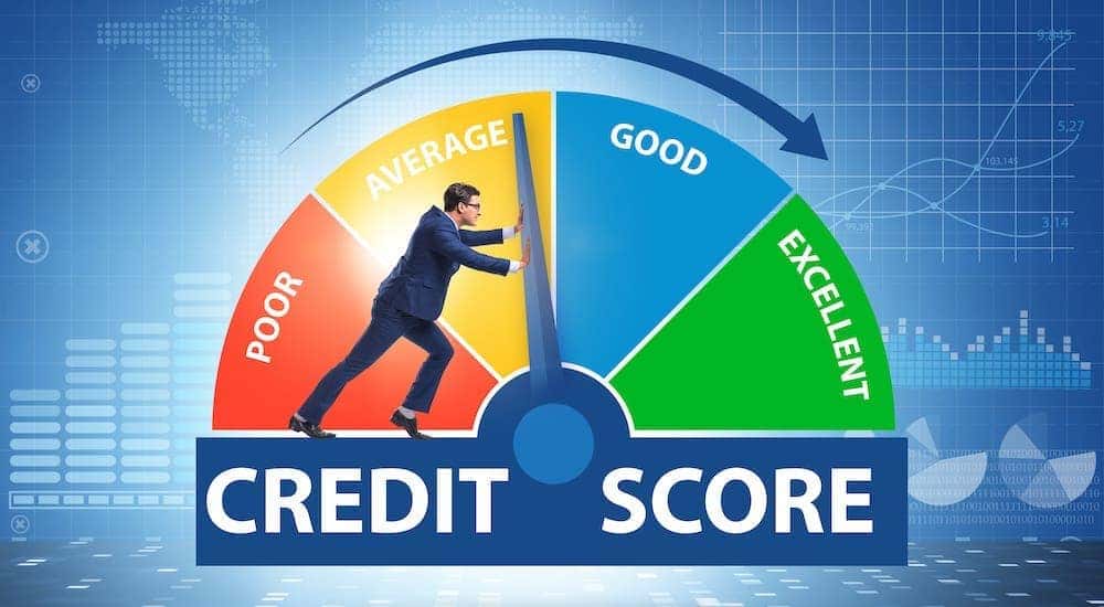 A man is pushing a dial on a circular credit score diagram from Average to Good credit.