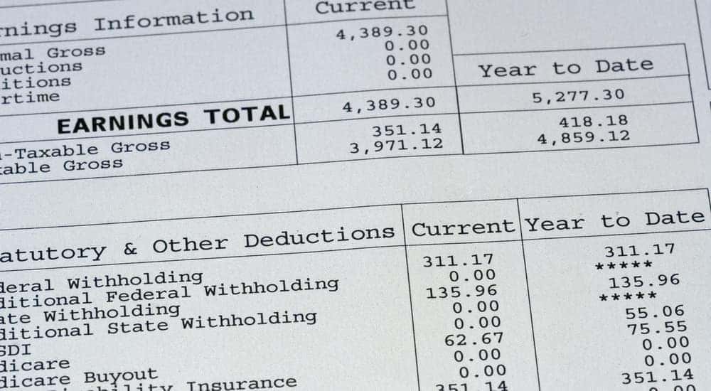 A close up of a pay stub is shown.
