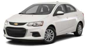 A white 2020 Chevy Sonic is facing left.