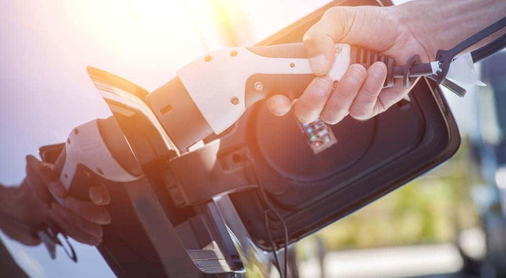 A fully electric car is being charged.