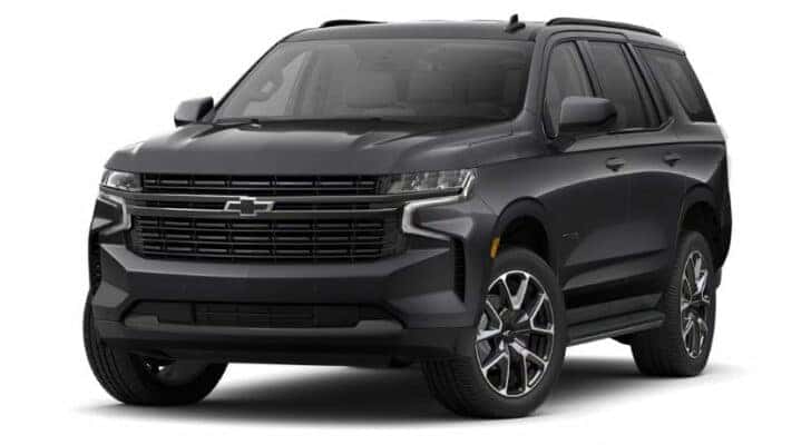 A black 2021 Chevy Tahoe RST is angled left.