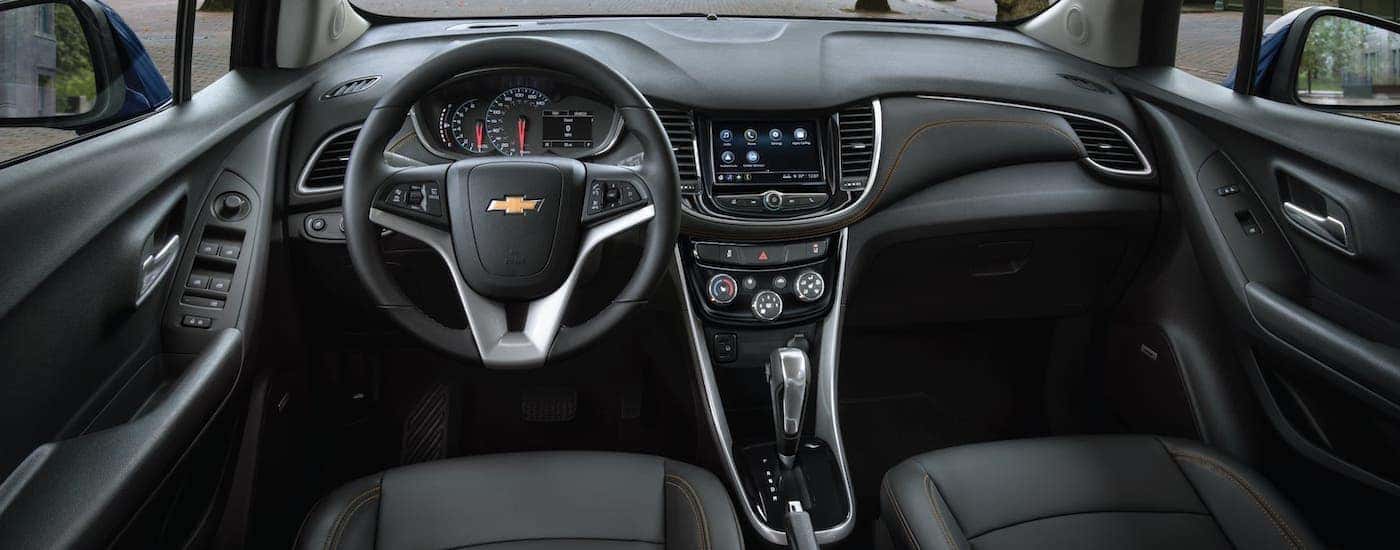 The black interior of a 2020 Chevy Trax is shown.