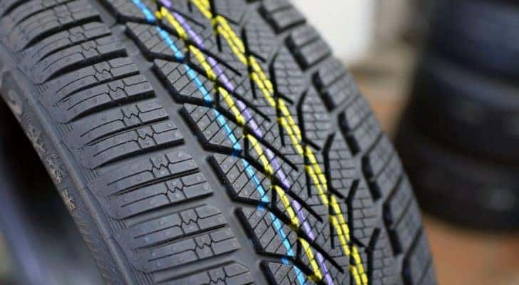 A closeup shows the treads on a Cincinnati car tire.