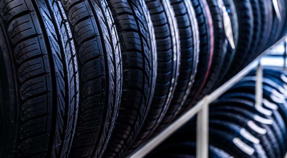 A rack of cheap tires in Cincinnati is shown.