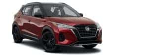 A red 2021 Nissan Kicks SR is angled right.