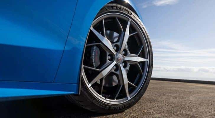 The wheel of a 2021 Chevy Corvette is shown in closeup.