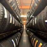 There are many Cincinnati tire shops, a row of tires is shown at one.