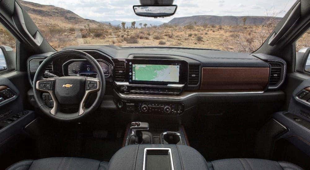 The interior of a 2022 Chevy Silverado 1500 High Country is shown from above the center console.