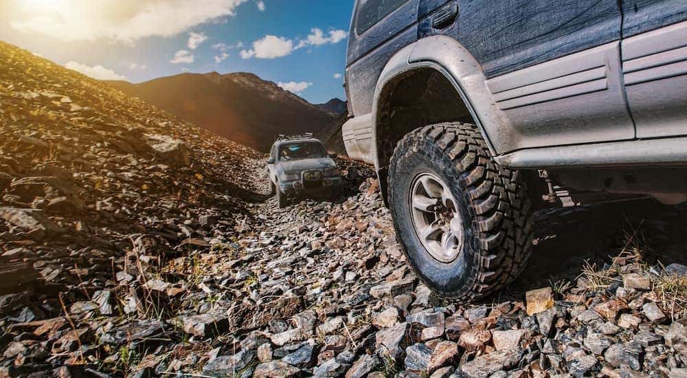 A vehicle is shown off-roading after searching for 'all-terrain tires in Cincinnati.'