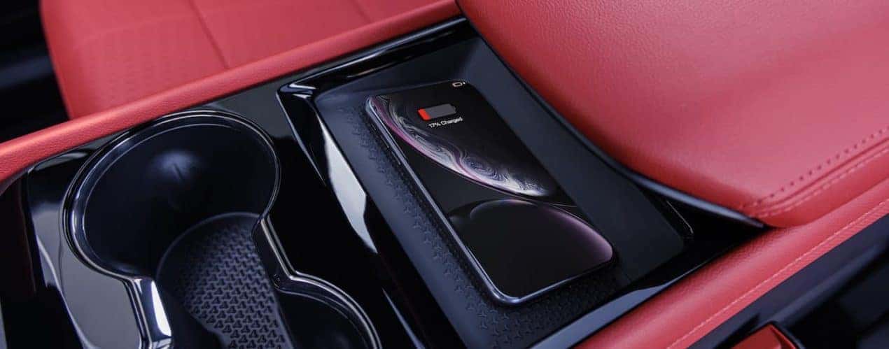 A phone is shown charging in the center console of a 2024 Chevy Blazer EV SS.