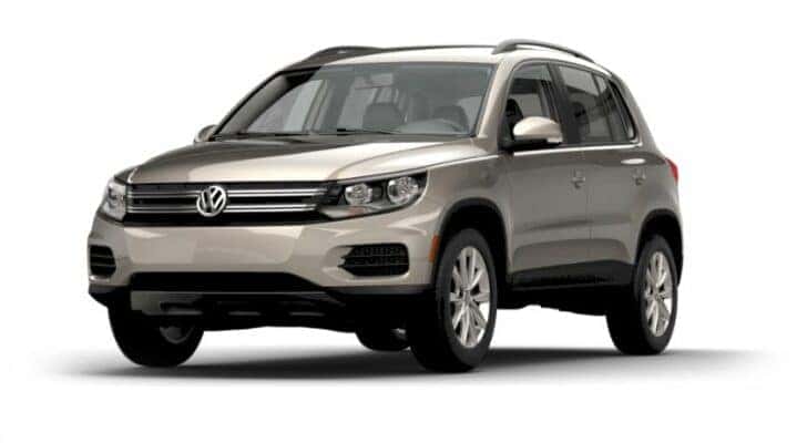 A tan 2015 Volkswagen Tiguan SE is angled left.