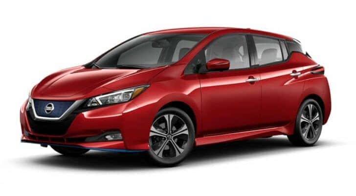 A red 2019 Nissan LEAF is angled left.