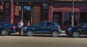 A blue 2020 Chevy Trax is shown from the side after leaving a dealer that had a used Chevy Trax.