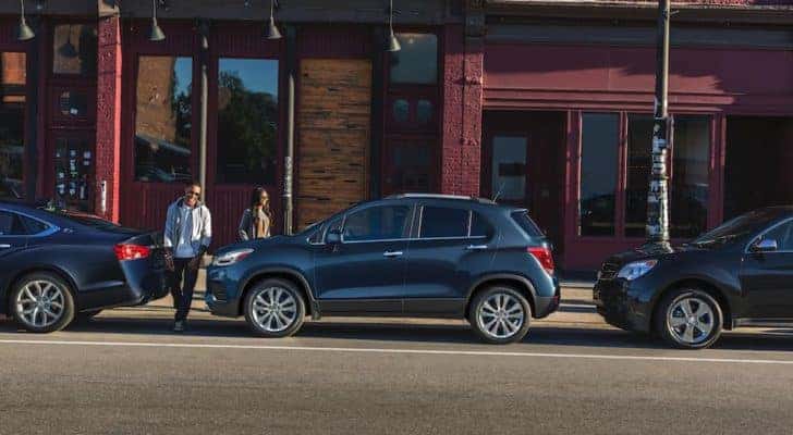 A blue 2020 Chevy Trax is shown from the side after leaving a dealer that had a used Chevy Trax.