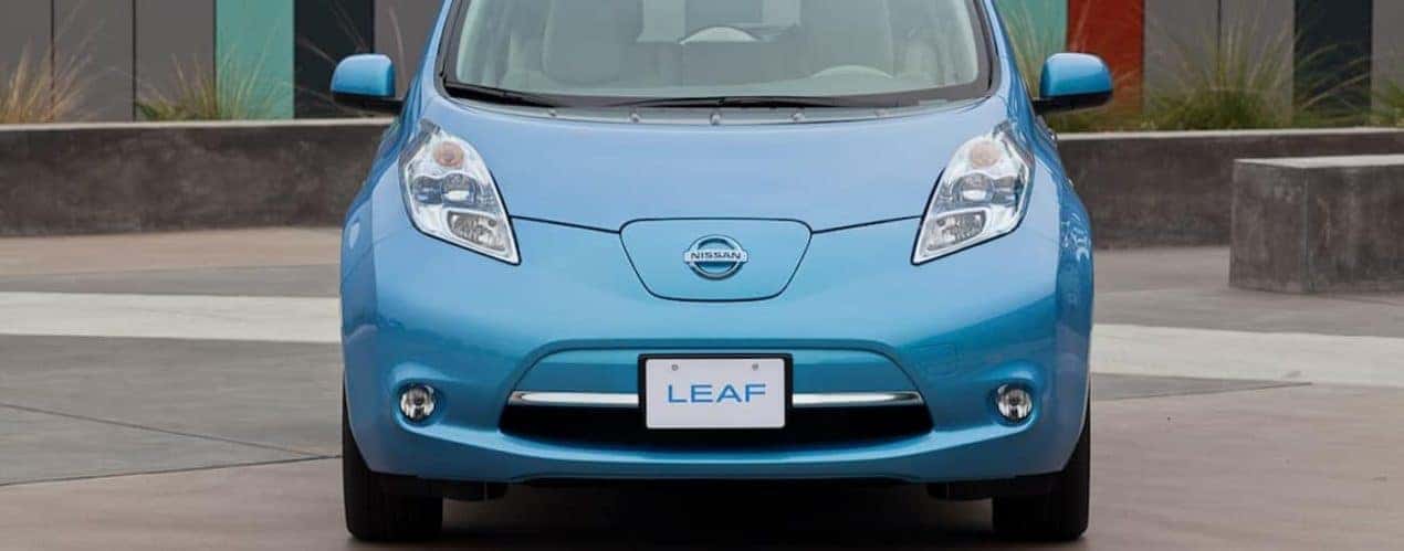 A blue used 2011 Nissan Leaf in Cincinnati, OH is shown from the front while parked.