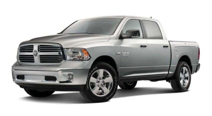 A silver 2017 Ram 1500 is angled left.