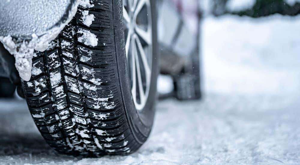 A car in shown in close up after leaving a tire store in Hamilton OH.