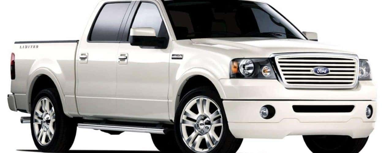 A white 2008 Ford F-150 Lariat is shown angled right.