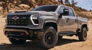 A grey 2024 Chevy Silverado 2500 HD ZR2 is shown angled left.