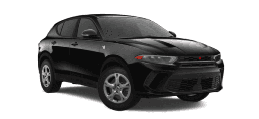 A black 2024 Dodge Hornet is shown angled right.