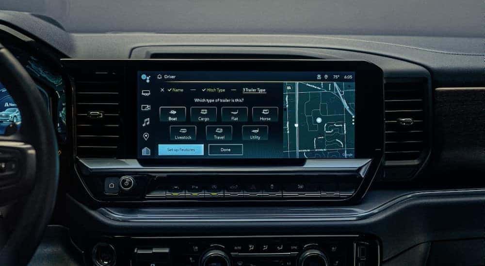 A close-up of an infotainment screen in a 2024 Chevy Silverado for sale is shown.