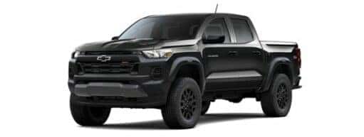A black 2024 Chevy Colorado Trail Boss is angled left.