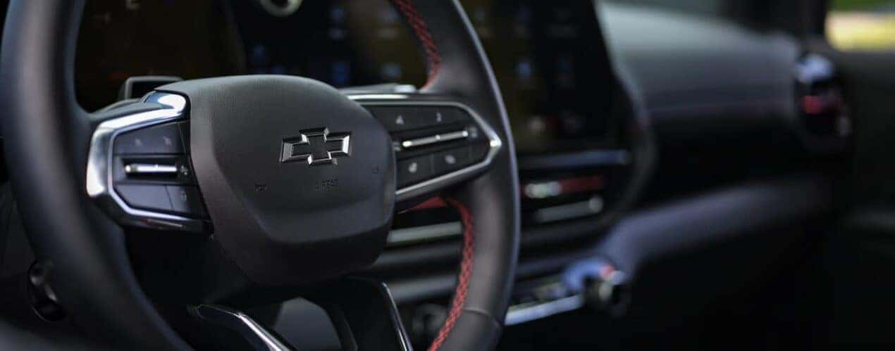 A close up of the steering wheel in a 2024 Chevy Silverado EV.