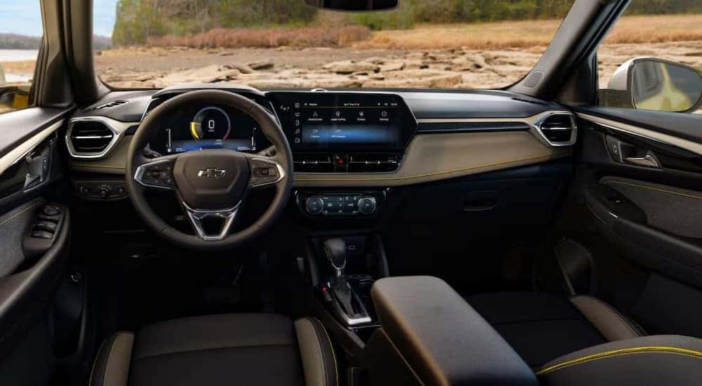 The black and gray interior and dash in a 2025 Chevy Trailblazer ACTIV is shown.