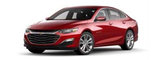 A red 2025 Chevy Malibu is angled left.