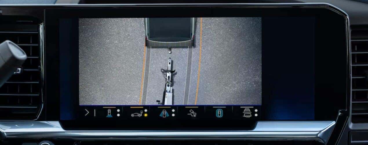 A close-up of a trailer cam image on a infotainment screen is shown in a 2025 Chevy Silverado 2500 HD.