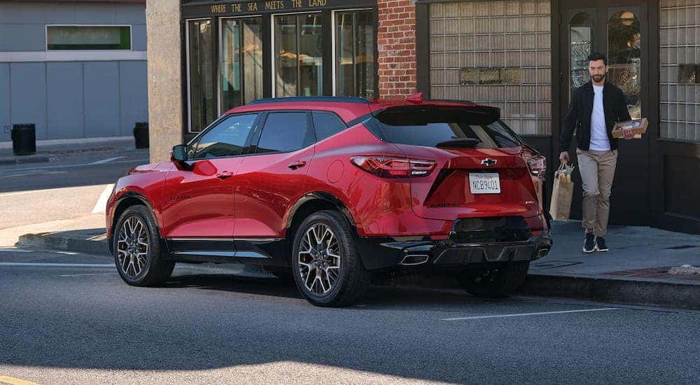 Rear angle view of a red 2025 Chevy Blazer RS.