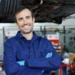A technician is shown smiling at a Buick service center in Cincinnati .
