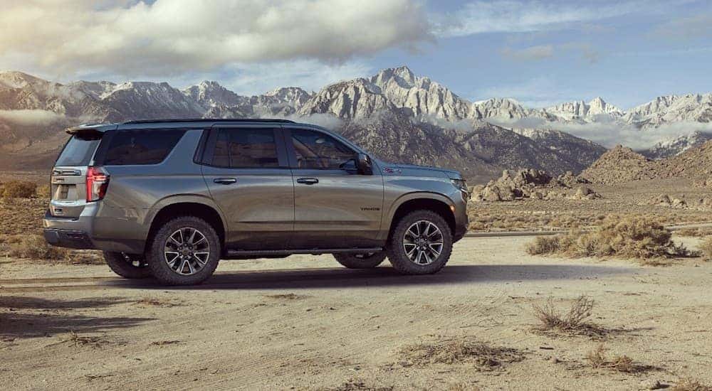Side angle view of a grey 2024 Chevy Tahoe Z71.