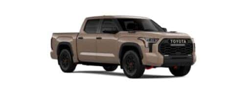 A tan 2025 Toyota Tundra is angled right.