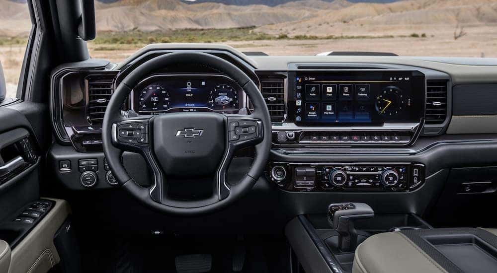 The black interior of a 2025 Chevy Silverado 1500 for sale in Cincinnati is shown.