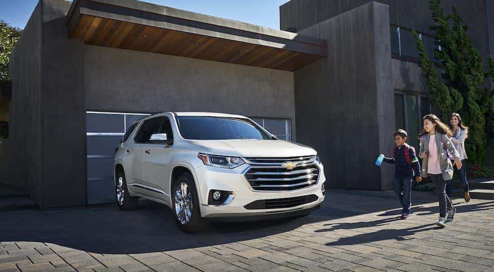A white 2021 Chevy Traverse is shown from the front at a angle.