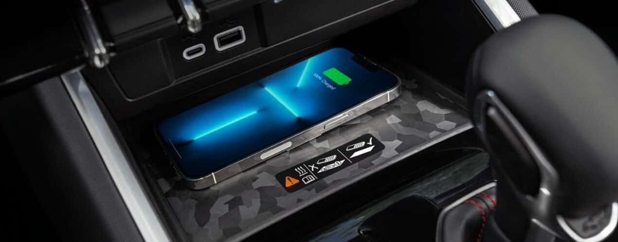 A phone is shown charging in a 2025 Chevy Colorado ZR2.