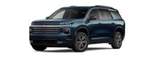 A blue 2025 Chevy Traverse is angled left.