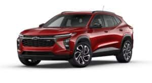 A red 2025 Chevy Trax 2RS is angled left.
