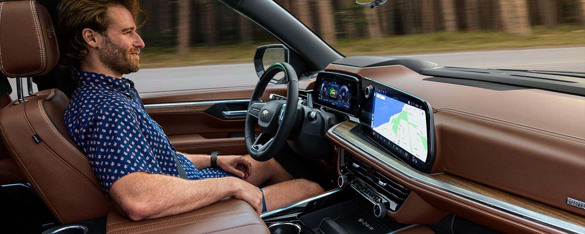 Person using SuperCruise in a 2025 Chevy Suburban.