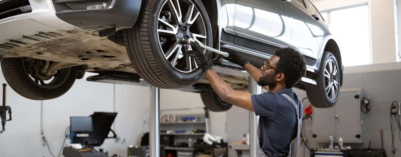 A technician working on a tire.