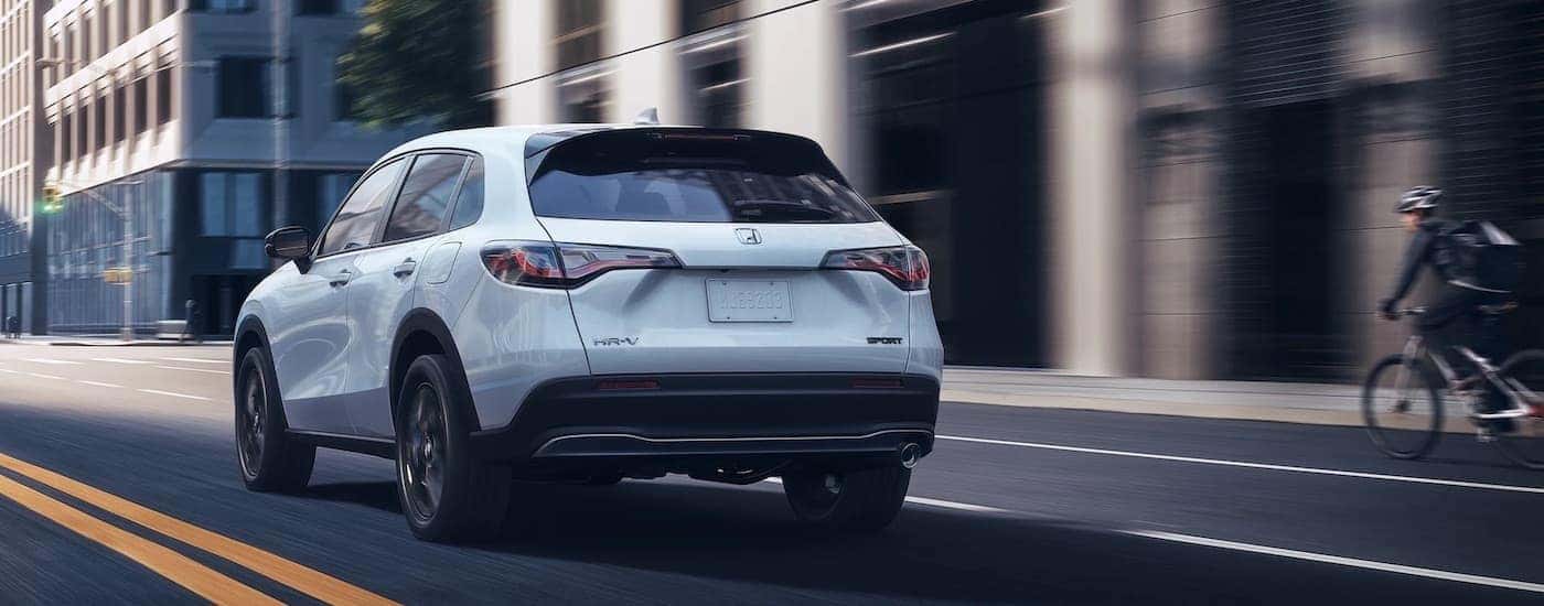 A white 2023 Honda HR-V from the rear.