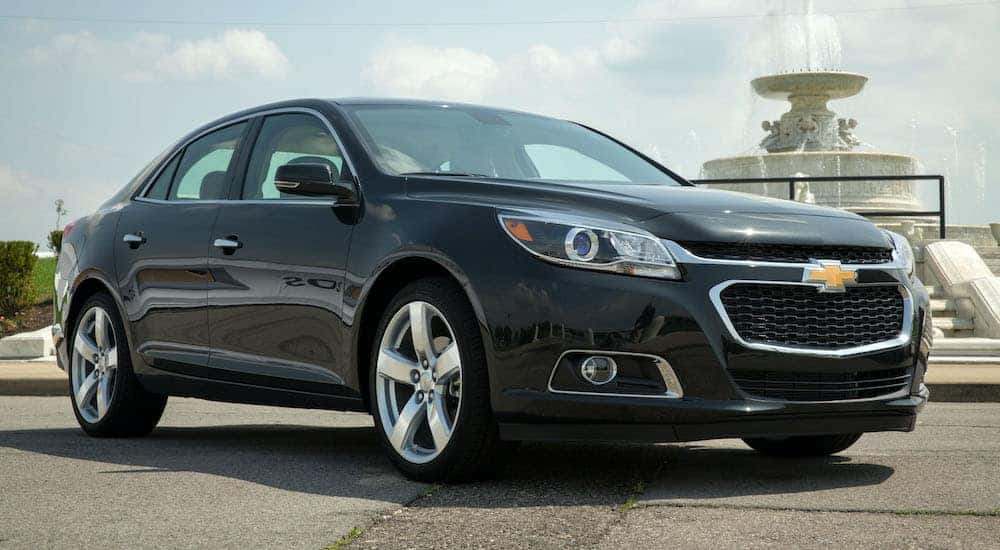 A black 2014 Chevy Malibu from the front.