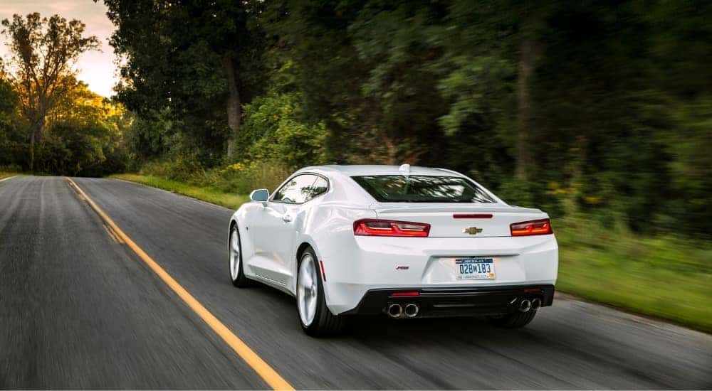 A white 2016 Chevy Camaro from behind.